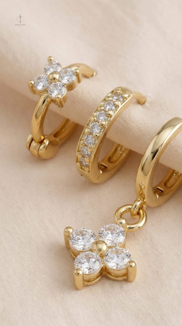 Bijoux tendance : boucles d'oreilles croisées dorées