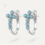 Boucles d'oreilles croix en argent avec accents turquoise