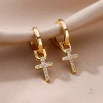 Accessoire de mode : boucles en croix scintillantes