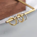 Bijoux croix, boucles d'oreilles tendance et raffinées