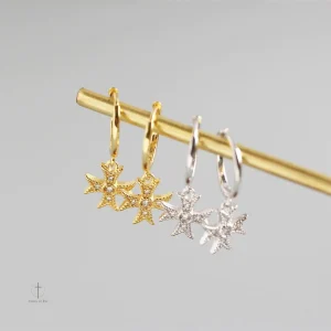 Accessoire mode croix, parfait pour un look sophistiqué