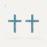 Boucles d'oreilles croisées avec pierres bleues éclatantes