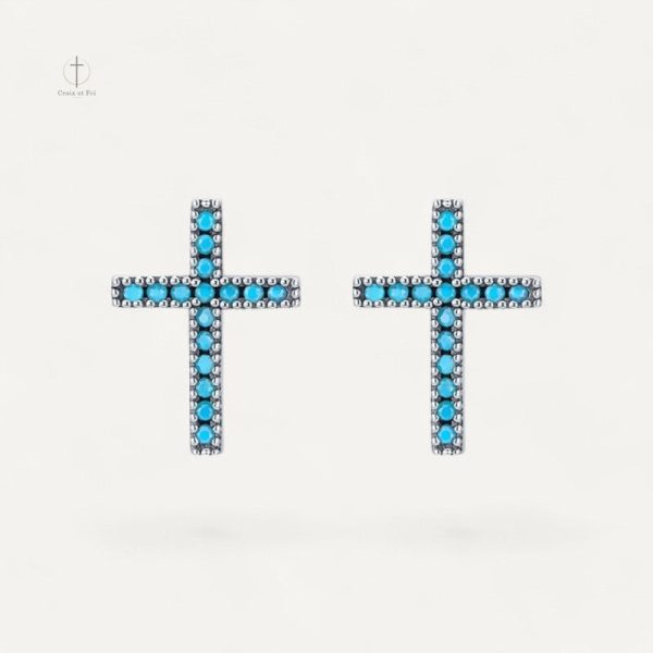 Boucles d'oreilles croisées avec pierres bleues éclatantes
