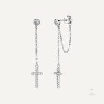 Accessoire tendance : boucles croisées plaquées or