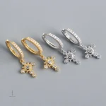 Accessoire chic : boucles d'oreilles croix intemporelles