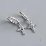 Design unique : boucles d'oreilles croix pour un look audacieux