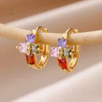 Boucles d'oreilles croix en créoles tendance