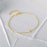 Bijou chrétien : bracelet croix en cuir et métal