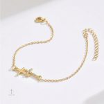 Accessoire mode : bracelet croix strass doré