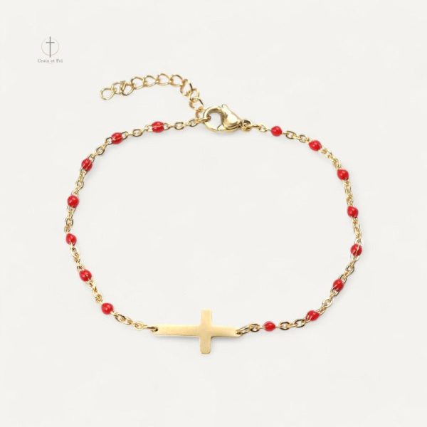 Bracelet croix chic en perles et dorure