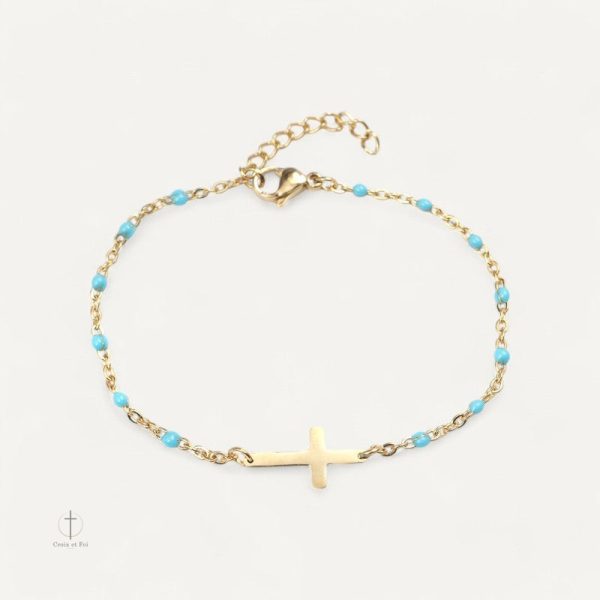 Bracelet moderne croix doré avec embellissements en perles