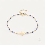 Bijou bracelet croix avec perles raffinées