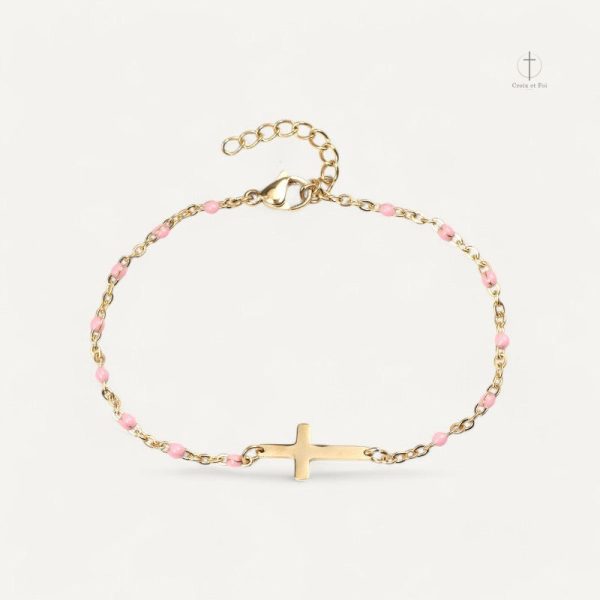 Bracelet croix doré, un bijou avec des perles uniques