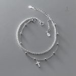 Bracelet Croix Éclat Céleste en métal brillant