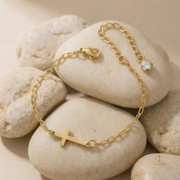 Bracelet or croisé, symbole de foi et de style