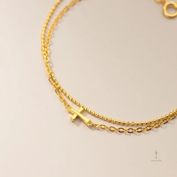 Bracelet Croix avec design épuré et lumineux