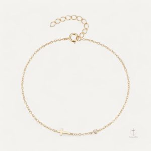 Bracelet croix orné d'une pierre précieuse élégante