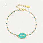 Bracelet chic avec charm croix en Émail