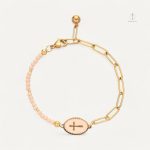 Bracelet en croix avec charmantes breloques