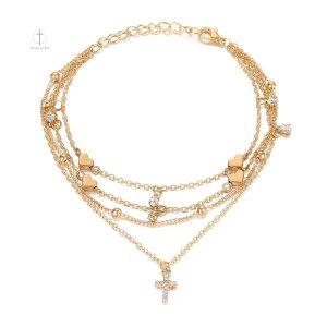 Bijou de cheville en forme de croix moderne