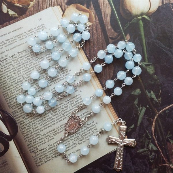 Chapelet bleu ciel avec perles délicates et pointes dorées
