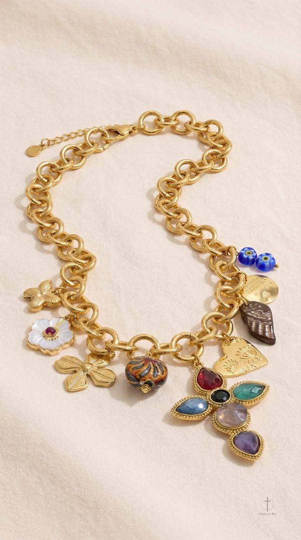 Accessoire doré style croix avec détail