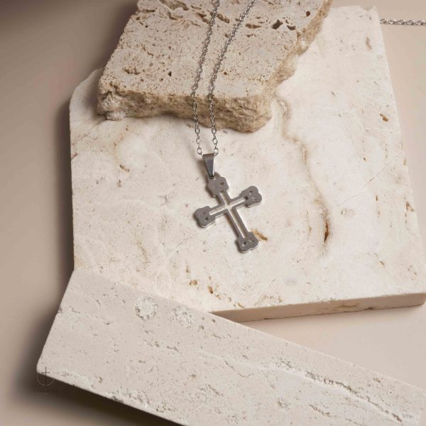 Accessoire religieux chic en forme de croix