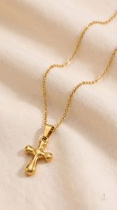 Accessoire en or avec design arrondi
