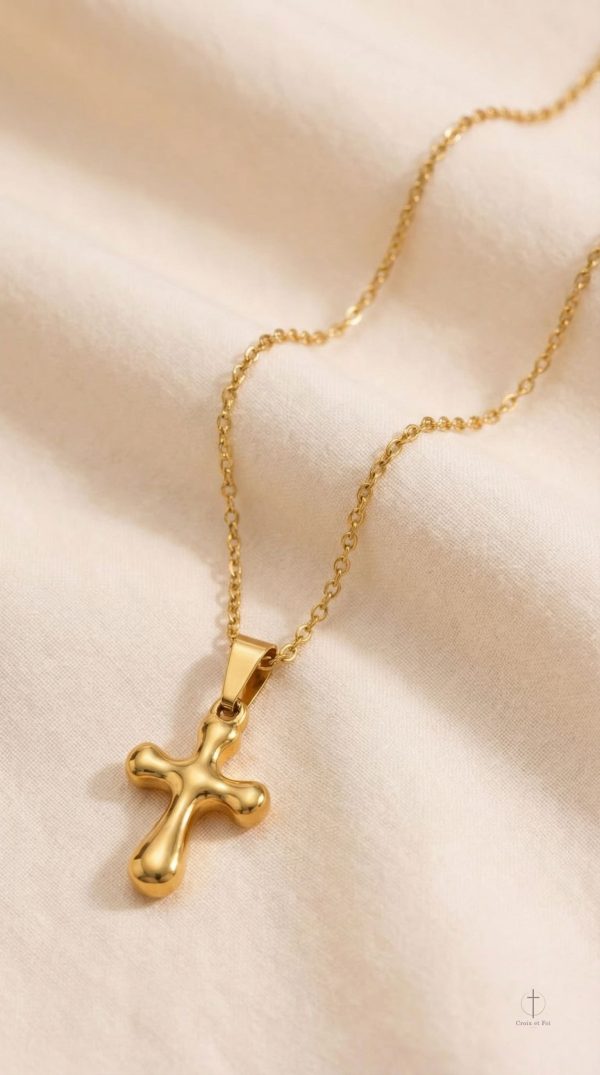 Accessoire en or avec design arrondi