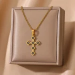 Collier croix en ébène avec finition dorée