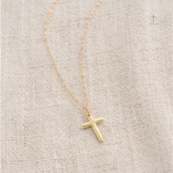 Accessoire élégant avec croix pour toutes occasions