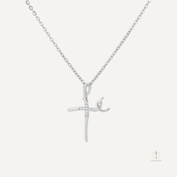 Accessoire Croix avec motif ondulé, style unique et raffiné