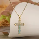 Bijou croix dorée, accessoire mode intemporel