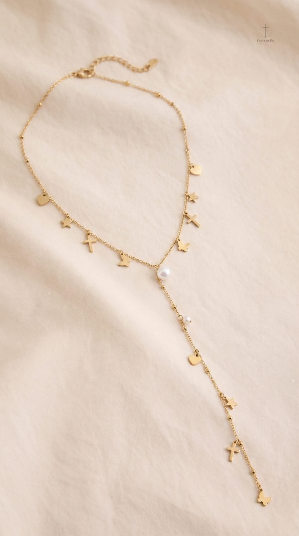 Bijou élégant : sautoir croix avec charms
