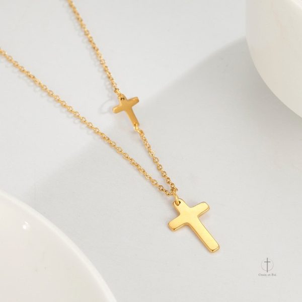 Accessoire tendance avec double croix stylisée