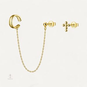 Mono boucle d'oreille croix élégante et contemporaine