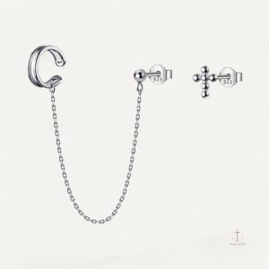 Accessoire tendance : mono boucle d'oreille croix chic